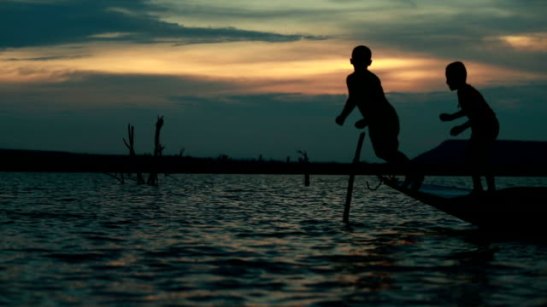 Video slow motion of Children's playing at lake in Thailand (HD)